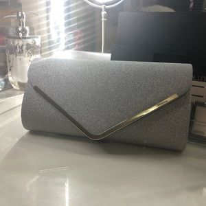 Silver glitter clutch